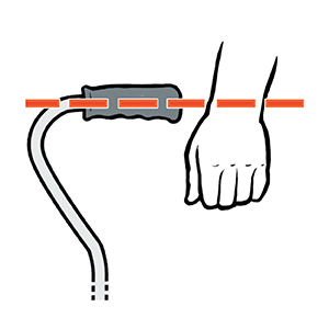 Primer plano del mango de un bastón con una línea punteada que indica que el mango está alineado con la muñeca.